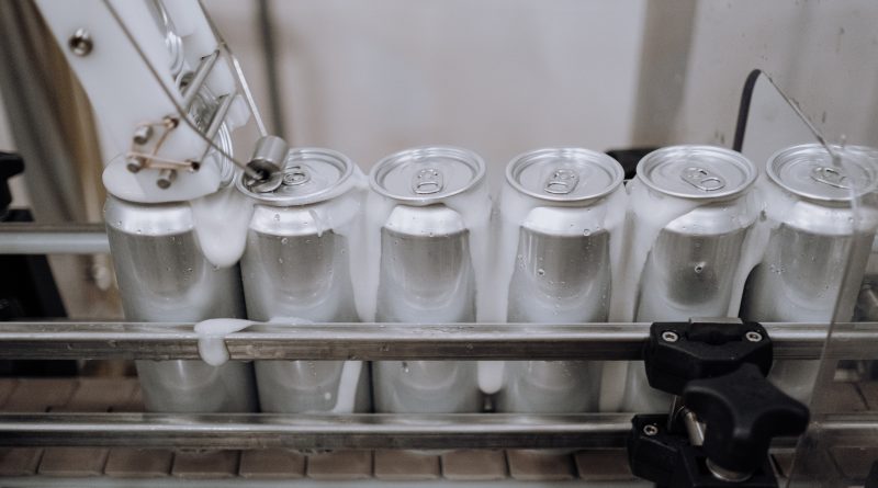 Cans being manufactured by automation technology