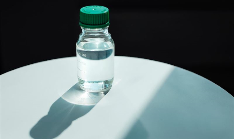 One of Neste's small PET bottles on a table.