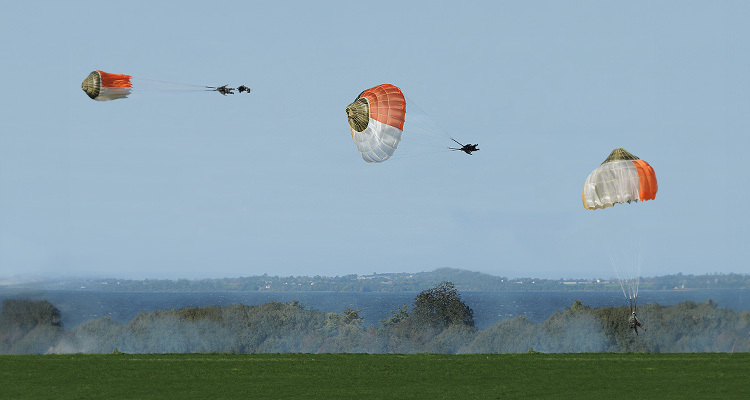 three military parachutes