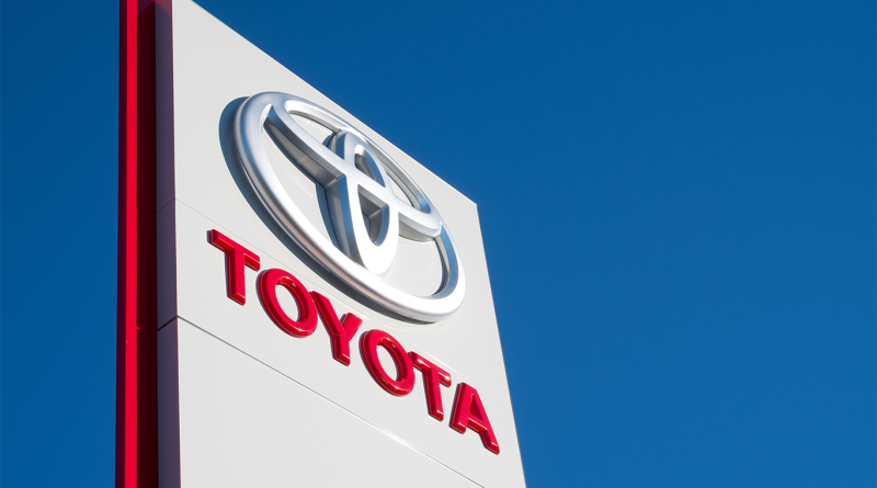 Image of the Toyota logo in front of a clear blue sky to support Toyota scandal article
