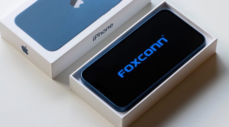 Box with image of phone next to Iphone by Apple, with Foxconn branding