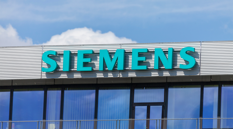 Siemens logo on building to support digital twin technology article