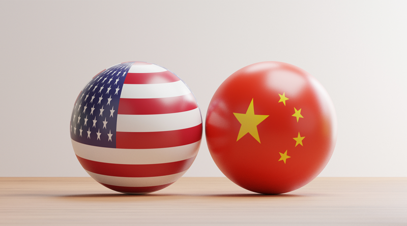 Two model globes, one with the US flag and the other with the Chinese flag to support U.S. tariffs article