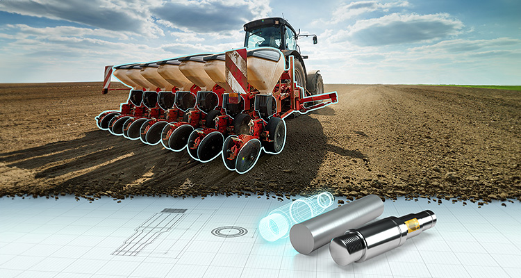 Graphic of a tractor with a seed drill above HBK sensors