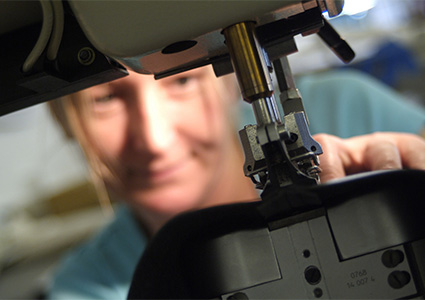 worker using sewing machine