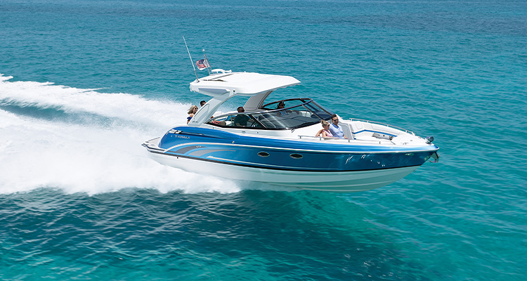 Powerboat skimming across waves in a turquoise sea