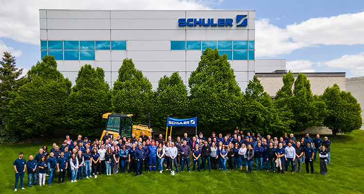 Schuler North America employees celebrate the building expansion during the recent groundbreaking ceremony.