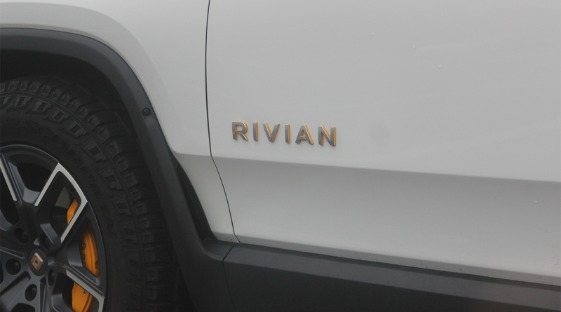 Side of white Rivian EV showing logo to support Georgia manufacturing site article