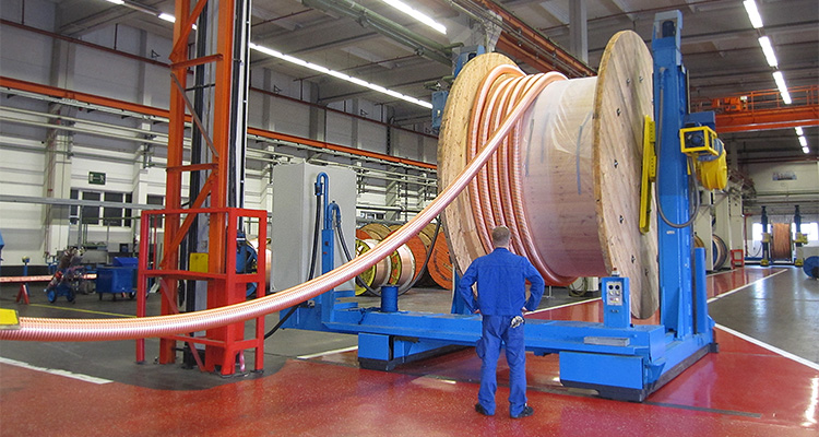 Cable being wound onto a huge drum
