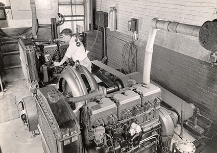 a man working on a large engine