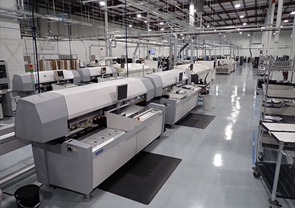 a manufacturing facility utilizing Surface Mount Technology (SMT), a method for assembling electronic components onto Printed Circuit Boards