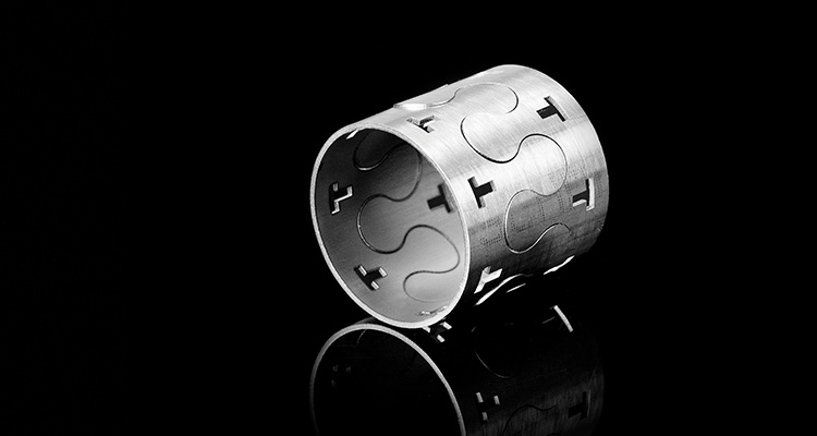 a metal pipe that has been cut with a laser