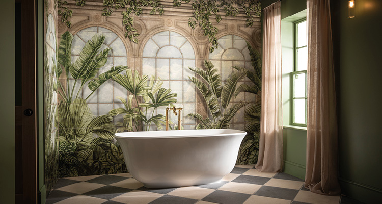 a luxuriously decorated bathroom featuring a large freestanding white bathtub.