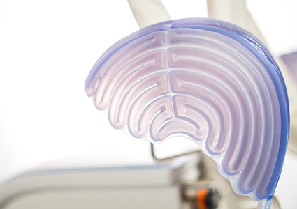  a silicone cap used for a Paxman scalp cooling system
