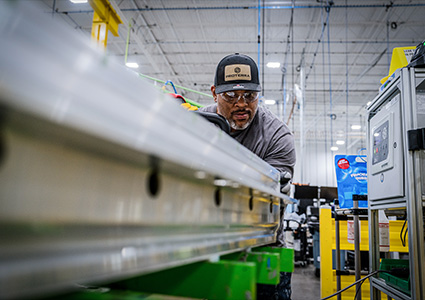  a worker on a production line