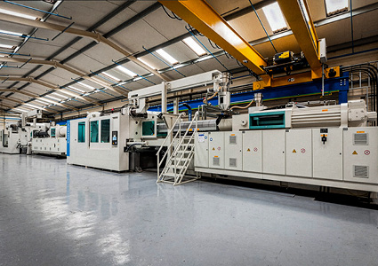 a series of industrial injection moulding machines