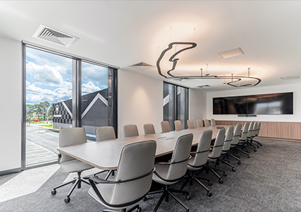 a contemporary boardroom in an industrial building