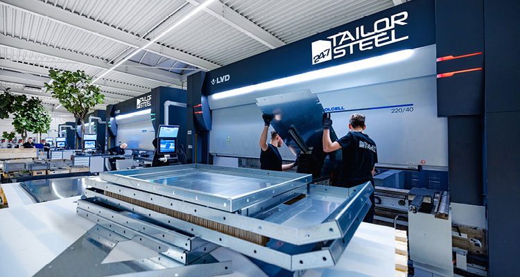an industrial metal bending machine used for sheet metal fabrication
