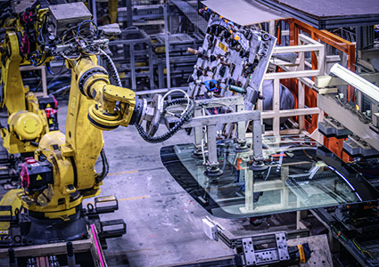 industrial robots used in an automotive production facility
