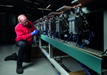 a technician working on industrial machinery