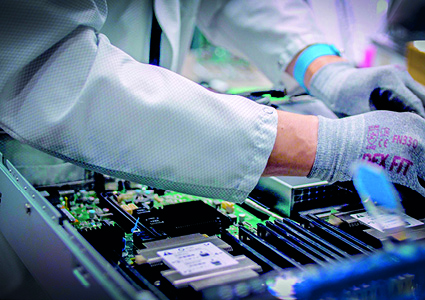 technician working on electronic circuit boards