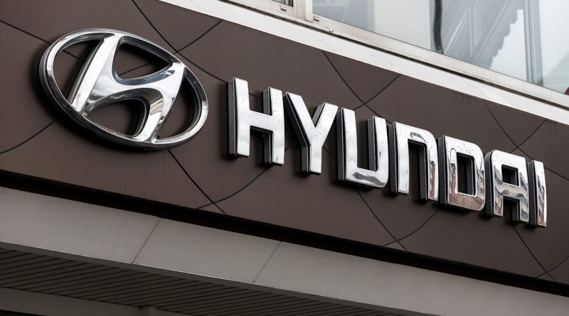 Boston Dynamics Atlas humanoid robot operating inside a Hyundai automotive manufacturing facility.