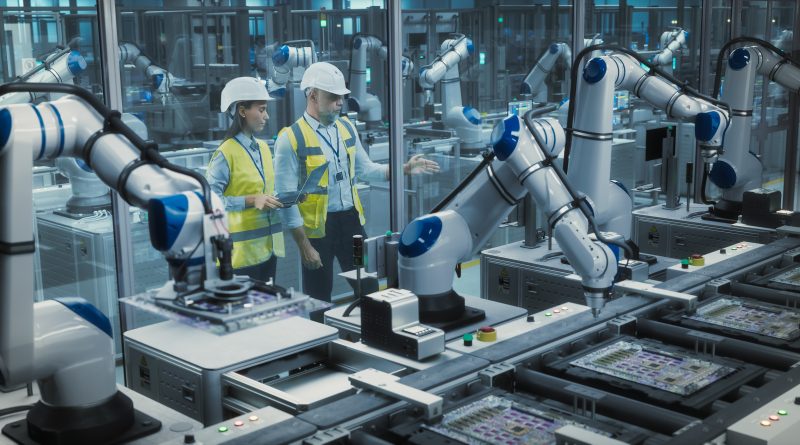 Factory production line using automation and AI systems inside a modern US manufacturing facility
