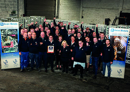 the workforce of Avon Metals, a Gloucester-based manufacturer of aluminum and copper alloy ingots, celebrating their 50th anniversary