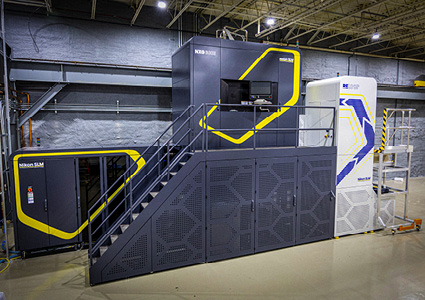 a Nikon SLM Solutions NXG XII 600 metal 3D printing system