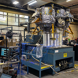 the Astrobotic Peregrine lunar lander undergoing pre-flight testing at a facility.