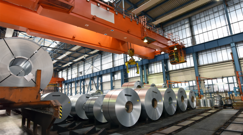 Industrial plant for the production of sheet metal in a steel mill.