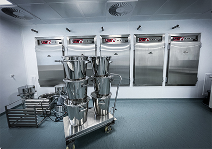 a clean, industrial room with stainless steel equipment