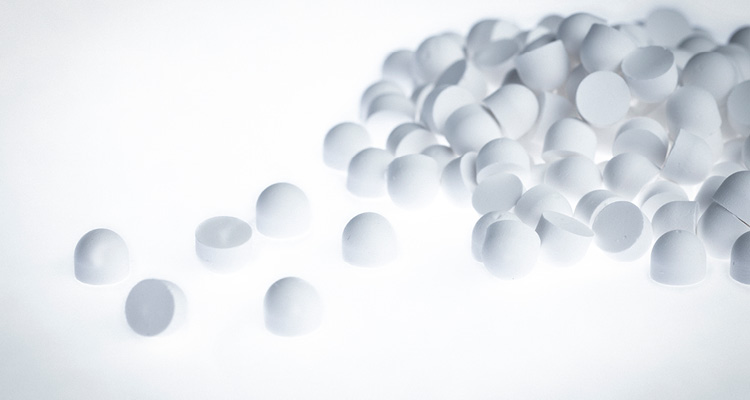 Biocomposites is scaling its world-class infection management operation while maintaining quality and culture loose, white, circular tablets