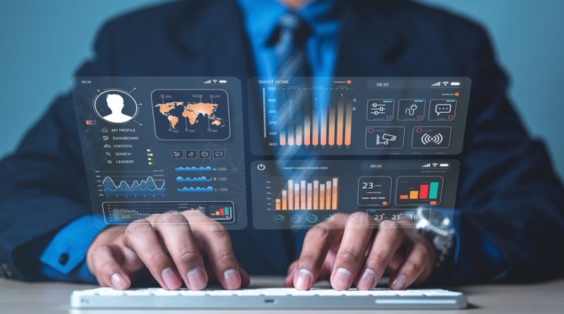 worker with data analytics screen