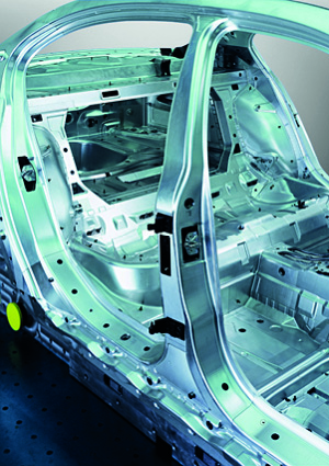 a close-up view of a unibody car chassis frame