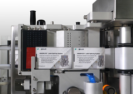 a specialized component of an industrial labeling machine designed for continuous production line operations