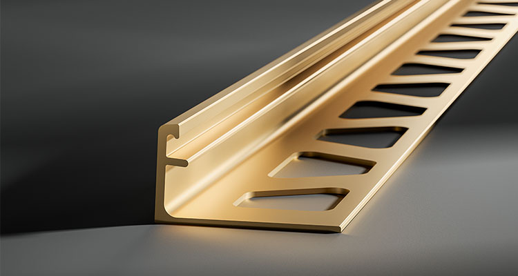 a Schluter SCHIENE-M straight-edge tile profile in solid brass