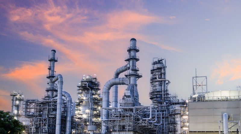 manufacturing plant at sunset