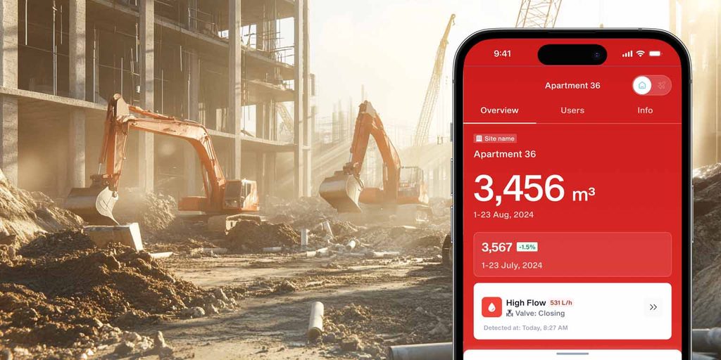 Construction site with excavators alongside a smartphone displaying a digital water monitoring dashboard and high-flow alert.