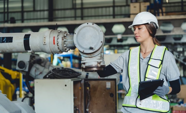 Maintenance engineer studying tablet