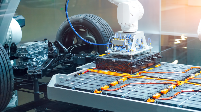 Mechanical engineering robotic arm installs lithium ion batteries into machine base, eco transport manufacturing and assembly