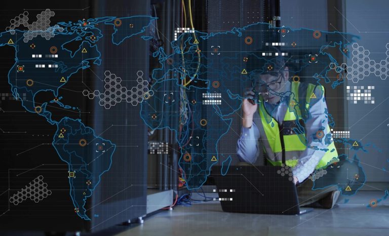 Technician working on data center server